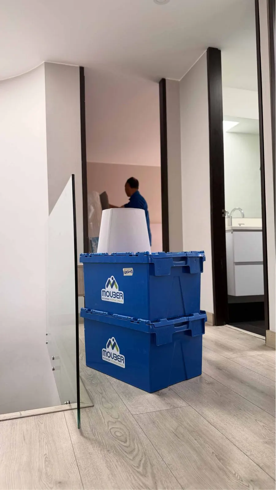 Blue Mouber plastic crates ready for a local move